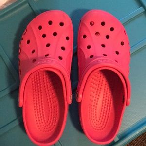 Pink crocs